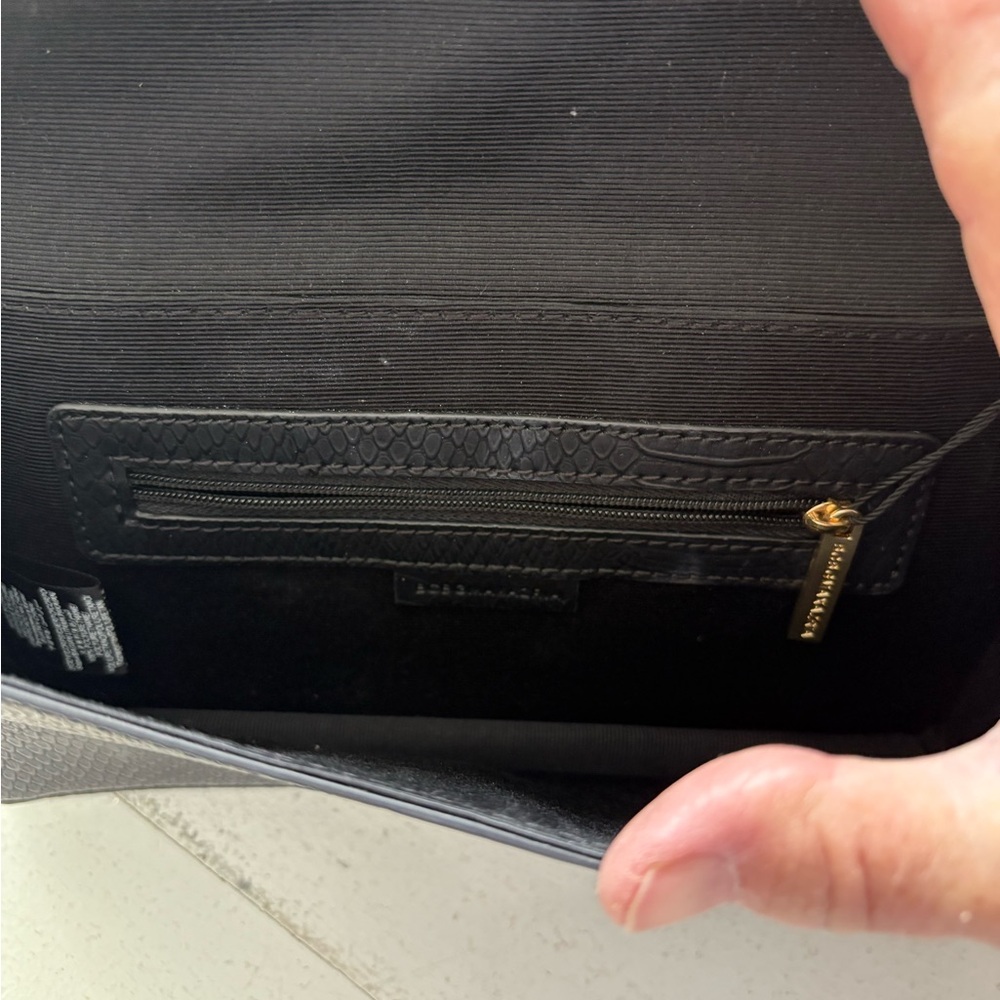 BCBGMAXAZRIA Black Clutch with Gold Accents. One stone missing on the front - Picture 6 of 7